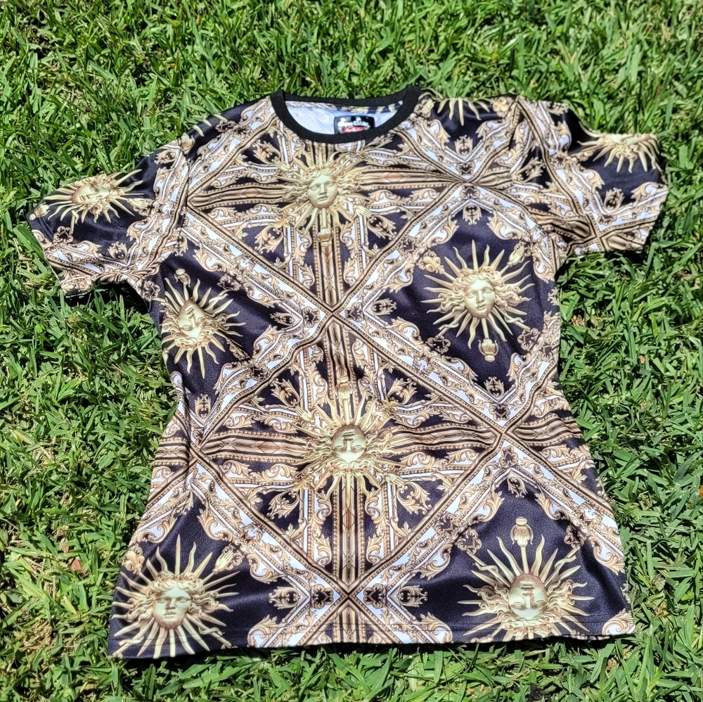 A royal, sun design shirt. Size- large